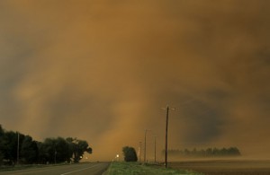 Underneath a violent storm in Texas - I love the telephone poles bending